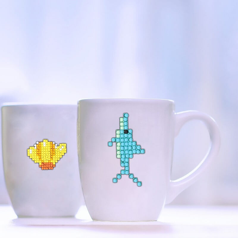 two diamond painting marine organism stickers on cup