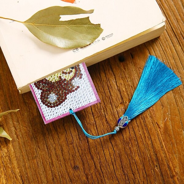 A book with diamond painting bookmark with tassel