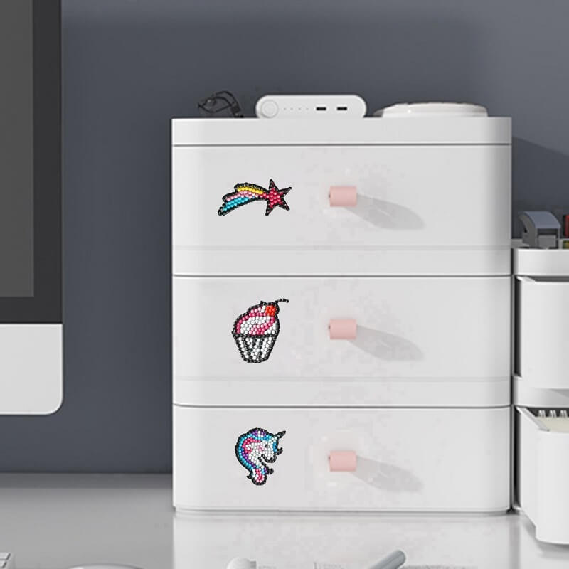 meteor, ice cream and unicorn diamond painting stickers on the white storage box